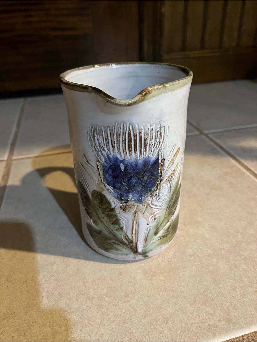 Handcrafted White Ceramic Pitcher with Blue Thistle Motif